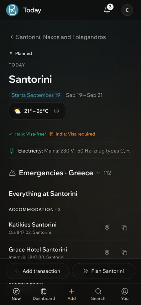 A phone showing today's plan for Santorini with weather and offline emergency numbers.